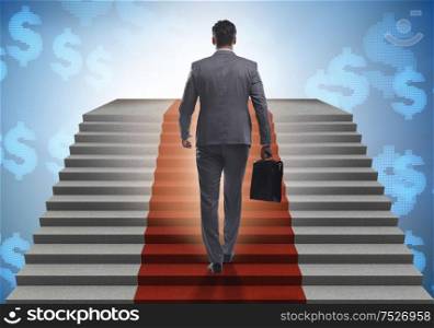 The young businessman climbing stairs and red carpet. Young businessman climbing stairs and red carpet