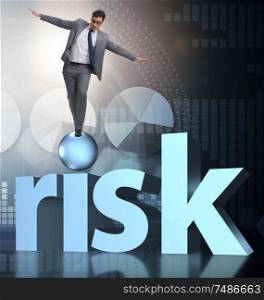 The young businessman in business risk and uncertainty concept. Young businessman in business risk and uncertainty concept