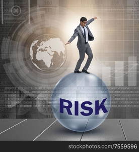 The young businessman in business risk and uncertainty concept. Young businessman in business risk and uncertainty concept