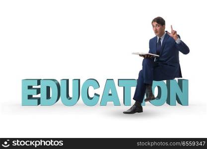 The young businessman in education concept. Young businessman in education concept. The young businessman in education concept