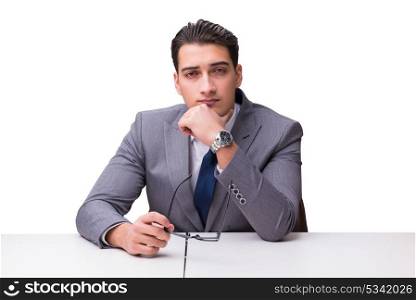 The young businessman isolated on white background. Young businessman isolated on white background