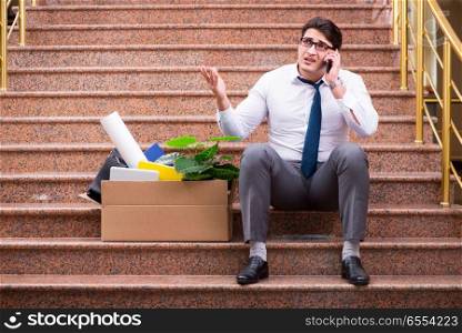 The young businessman on the street after dismissal. Young businessman on the street after dismissal