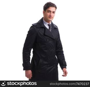 The young businessman wearing winter coat isolated on white. Young businessman wearing winter coat isolated on white