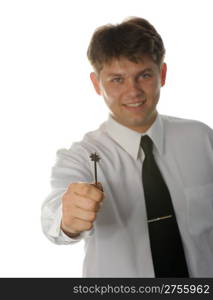 The young businessman with a key in a hand. It is isolated on a white background