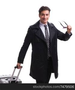 The young businessman with suitcase ready for business trip on white. Young businessman with suitcase ready for business trip on white