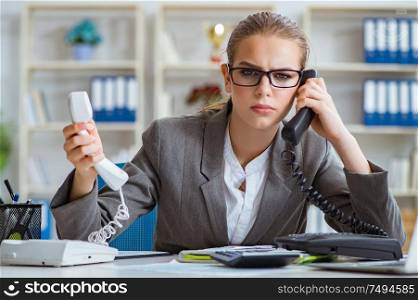 The young businesswoman accountant working in the office. Young businesswoman accountant working in the office