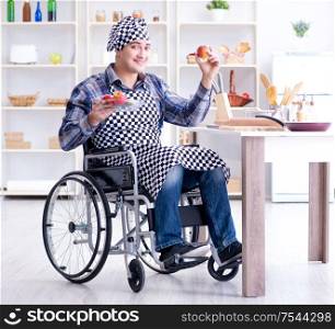 The young disabled husband preparing food salad. Young disabled husband preparing food salad
