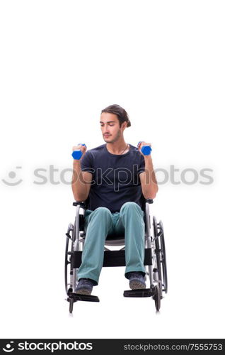 The young disabled man doing physical exercises isolated on white. Young disabled man doing physical exercises isolated on white