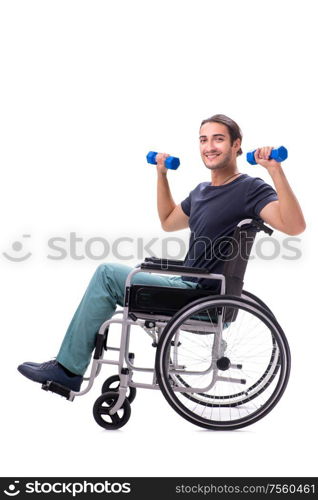 The young disabled man doing physical exercises isolated on white. Young disabled man doing physical exercises isolated on white