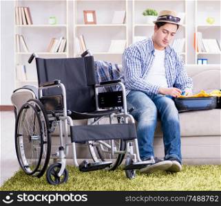The young disabled man preparing for summer vacation. Young disabled man preparing for summer vacation