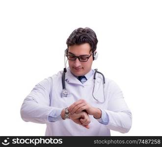 The young doctor with phone headset isolated on white. Young doctor with phone headset isolated on white