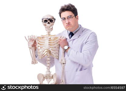 The young doctor with skeleton isolated on white. Young doctor with skeleton isolated on white