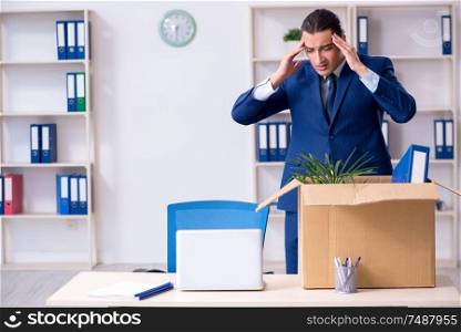 The young employee being made redundant. Young employee being made redundant