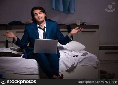 The young employee working at home after night shift. Young employee working at home after night shift