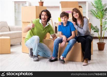 The young family moving to new flat . Young family moving to new flat