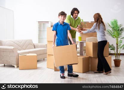 The young family moving to new flat . Young family moving to new flat