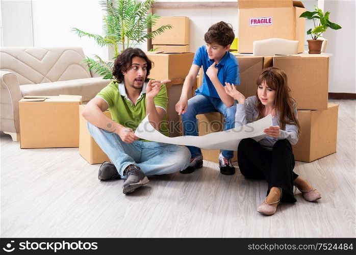 The young family moving to new flat. Young family moving to new flat