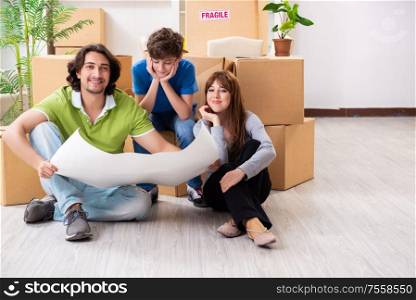 The young family moving to new flat. Young family moving to new flat