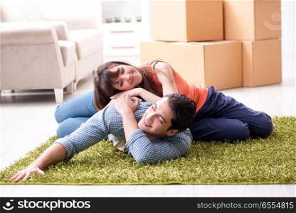 The young family moving to new house after final payment. Young family moving to new house after final payment