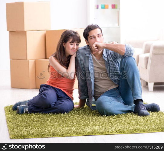 The young family moving to new house after final payment. Young family moving to new house after final payment