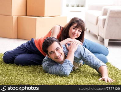 The young family moving to new house after final payment. Young family moving to new house after final payment