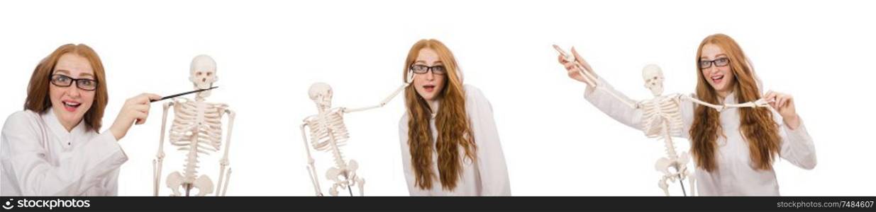 The young female doctor with skeleton isolated on white. Young female doctor with skeleton isolated on white