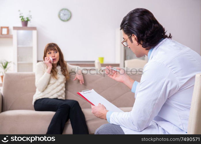 The young female patient discussing with male psychologist personal. Young female patient discussing with male psychologist personal