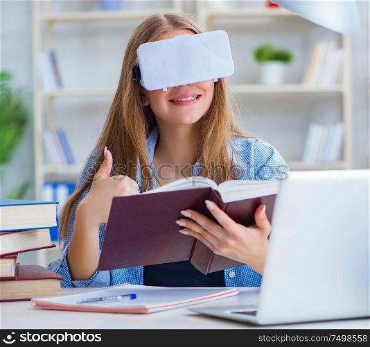 The young female student preparing for exams with vr glasses. Young female student preparing for exams with VR glasses