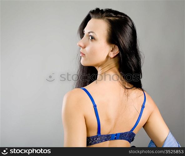 The young girl in dark blue linen with the big breast