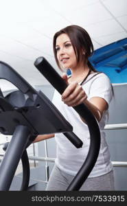 The young girl on a racetrack close up