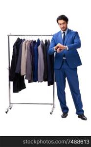 The young handsome businessman in clothing concept. Young handsome businessman in clothing concept