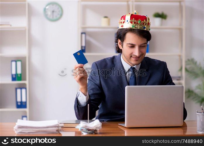The young king businessman working in the office. Young king businessman working in the office
