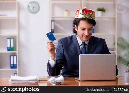 The young king businessman working in the office. Young king businessman working in the office