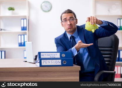 The young male accountant working in the office. Young male accountant working in the office