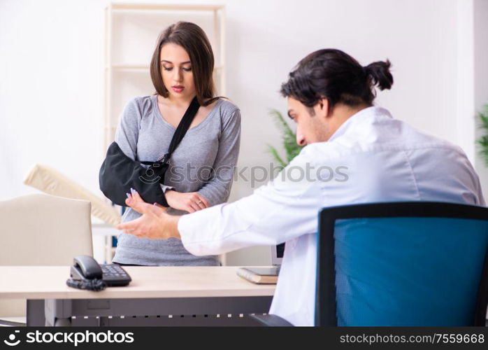 The young male doctor and female beautiful patient. Young male doctor and female beautiful patient