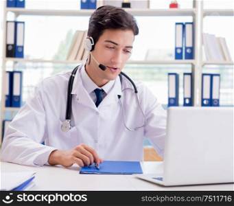 The young male doctor in telehealth concept. Young male doctor in telehealth concept