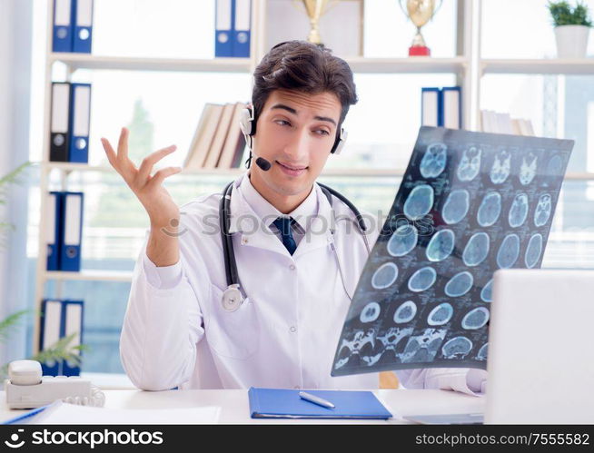 The young male doctor in telehealth concept. Young male doctor in telehealth concept