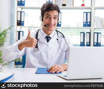 The young male doctor in telehealth concept. Young male doctor in telehealth concept