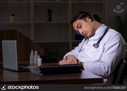 The young male doctor in the hospital at night. Young male doctor in the hospital at night