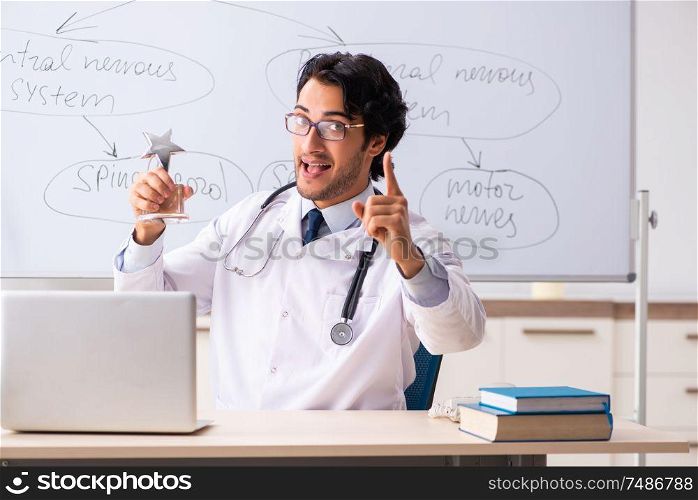 The young male doctor neurologist in front of whiteboard. Young male doctor neurologist in front of whiteboard