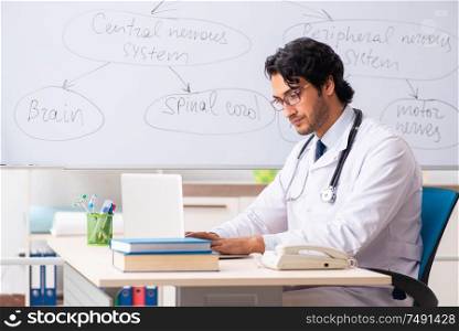 The young male doctor neurologist in front of whiteboard. Young male doctor neurologist in front of whiteboard