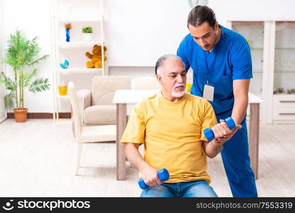 The young male doctor visiting old patient at home. Young male doctor visiting old patient at home