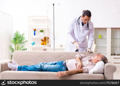 The young male doctor visiting old patient at home. Young male doctor visiting old patient at home