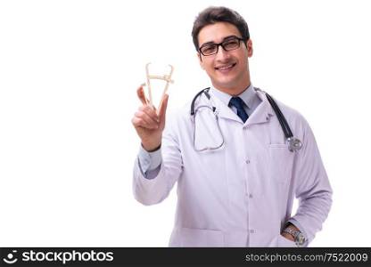 The young male doctor with calipers isolated on white. Young male doctor with calipers isolated on white