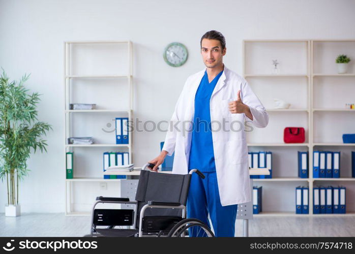 The young male doctor working in the clinic. Young male doctor working in the clinic