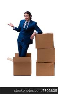 The young male employee with boxes isolated on white. Young male employee with boxes isolated on white