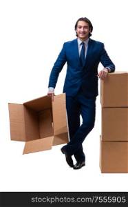 The young male employee with boxes isolated on white. Young male employee with boxes isolated on white