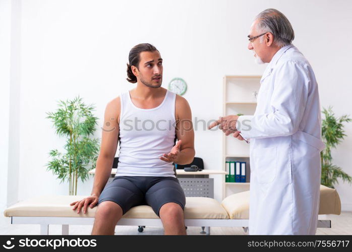 The young male patient visiting experienced doctor. Young male patient visiting experienced doctor