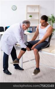 The young male patient visiting experienced doctor. Young male patient visiting experienced doctor