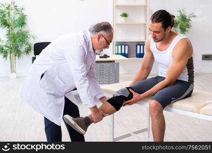 The young male patient visiting experienced doctor. Young male patient visiting experienced doctor